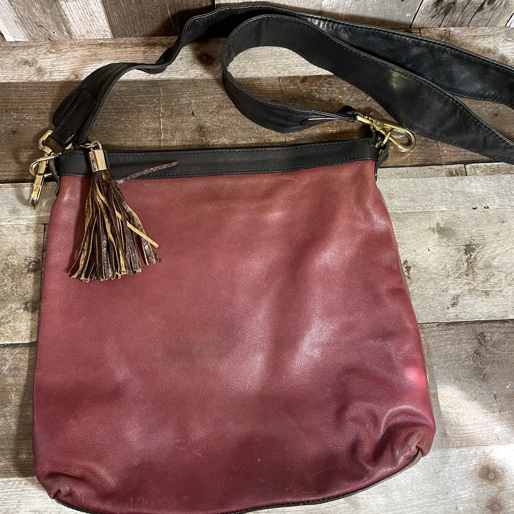 INNUE two tone burgundy/tan leather crossbody bag with black trim Made in Italy